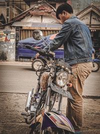 Man riding bicycle in city