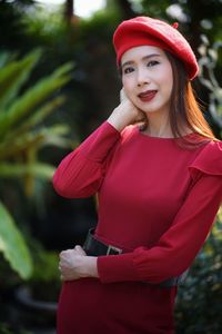 Portrait of woman standing outdoors