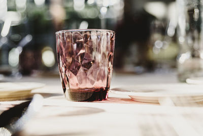 Close-up of coffee in glass on table