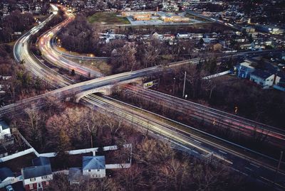 High angle view of light trails on road in city