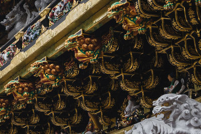 Low angle view of buddha statue in building
