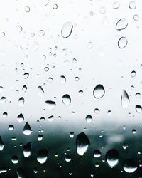 Close-up of water drops on glass