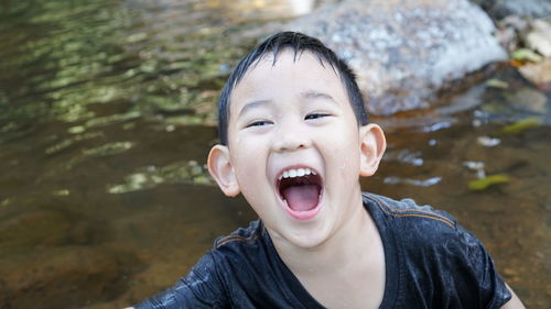 Portrait of boy in water