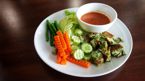 High angle view of salad in plate on table