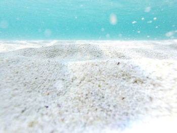 Close-up of sand on beach