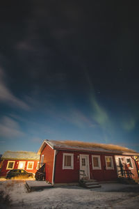 Low angle view of building against sky at night