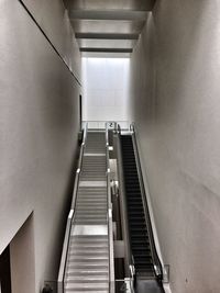 Low angle view of escalator in building