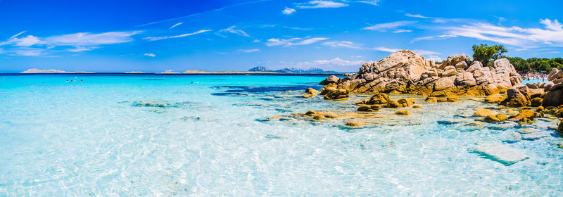 Scenic view of sea against blue sky