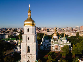 High angle view of buildings in city against sky