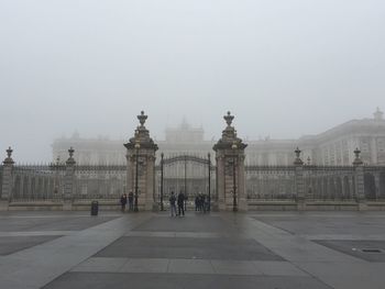 Tourists in front of historical building