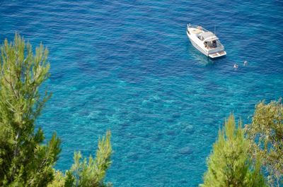 High angle view of ship sailing in sea