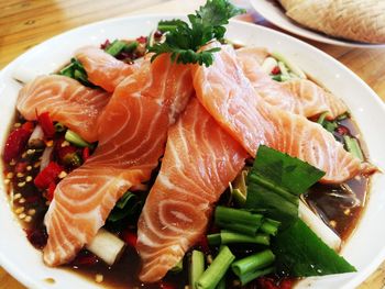 High angle view of fish served in plate on table