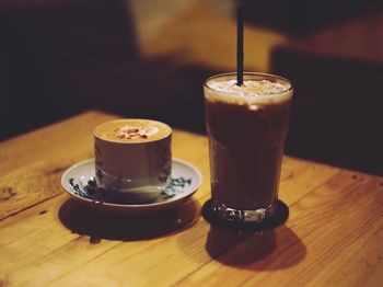 Close-up of coffee served on table