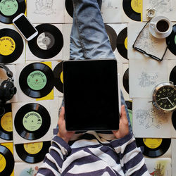 Directly above view of man using laptop on table