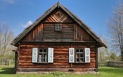 An old wooden country house. a historic wooden thatched house in the bialystok village museum