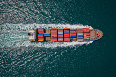 High angle view of ship sailing on sea