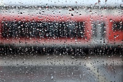 Full frame shot of wet window during rainy season