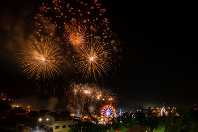 Firework display at night