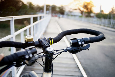 Close-up of bicycle on road