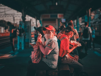 People walking on street in city