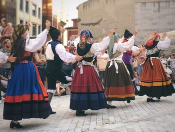 Group of people on street in city