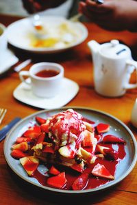 Close-up of breakfast served on table