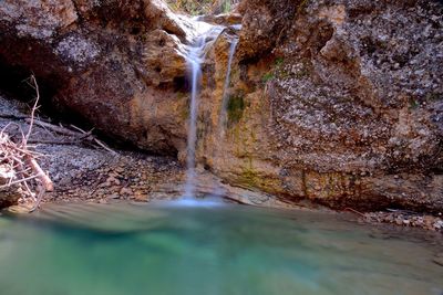 River amidst rock formation