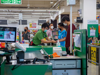 Group of people working on table