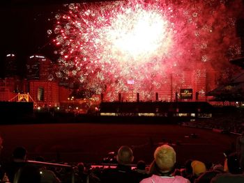 View of firework display at night