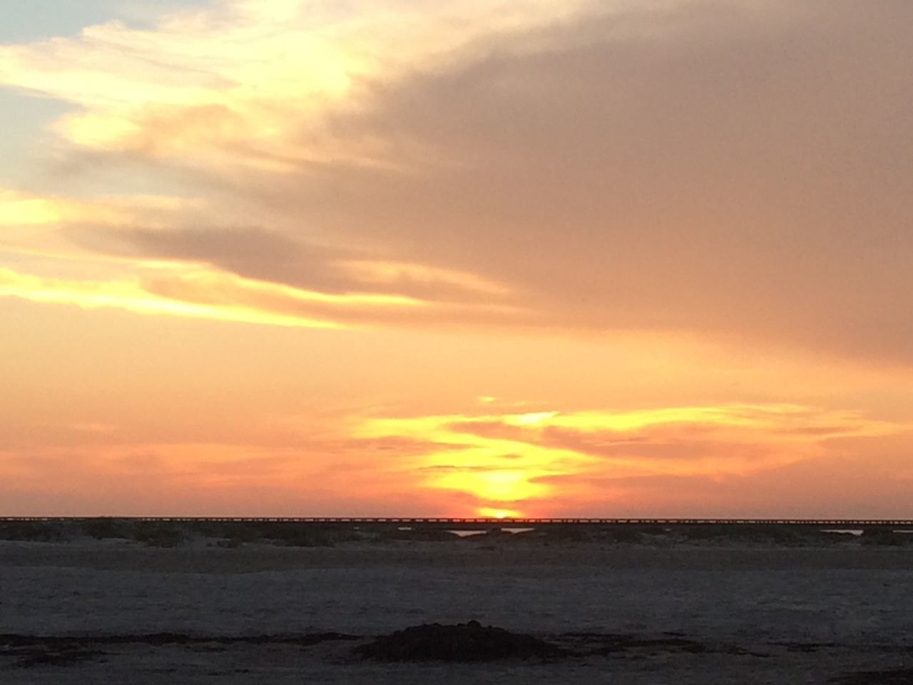 sunset, sea, water, horizon over water, scenics, orange color, sky, tranquil scene, beauty in nature, tranquility, waterfront, idyllic, nature, cloud - sky, beach, cloud, sun, outdoors, shore, no people