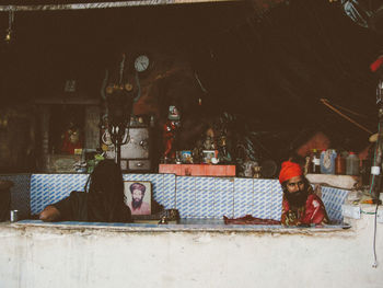 High angle view of people relaxing on floor