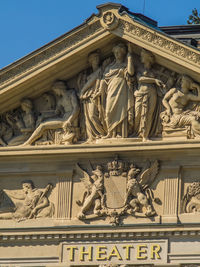 Low angle view of statues on building