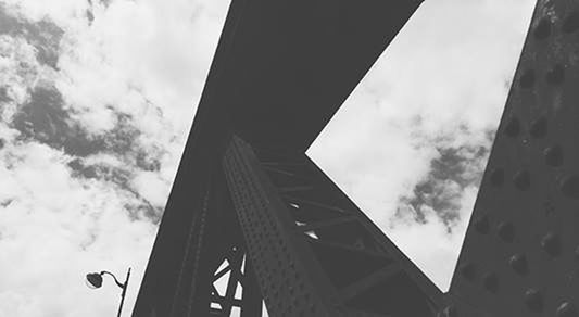architecture, built structure, low angle view, sky, building exterior, cloud - sky, cloudy, cloud, building, city, day, no people, outdoors, modern, connection, tower, directly below, glass - material, reflection, bridge - man made structure