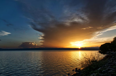 Scenic view of sea against sky during sunset