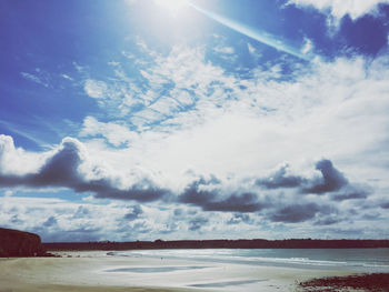 Scenic view of cloudscape over sea against sky