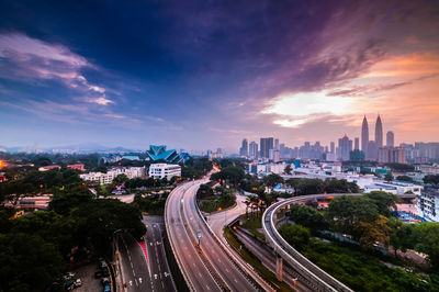 High angle shot of road against city