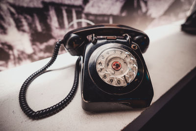 A classic and vintage black rotary phone