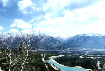 Scenic view of mountains against sky during winter