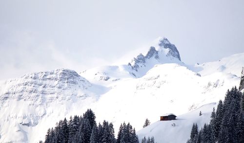 Scenic view of snow covered mountains