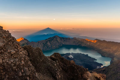 Scenic view of mountains against sky during sunset