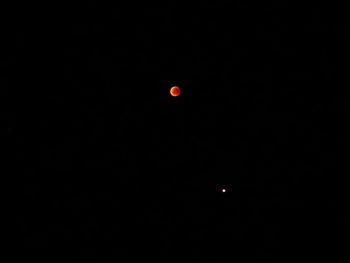 Scenic view of moon against sky at night