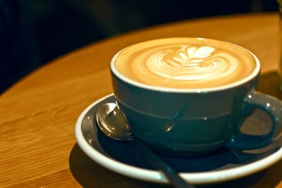 Close-up of coffee cup on table