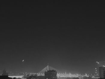 Illuminated buildings in city at night