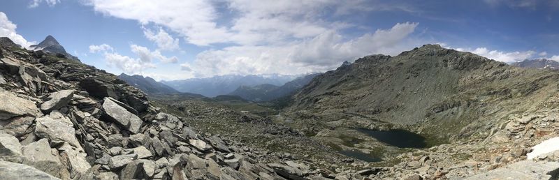 Panoramic view of mountain range against sky