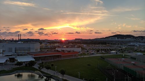 High angle view of buildings against sky during sunset