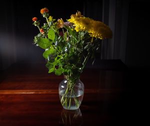 Close-up of flower vase on table