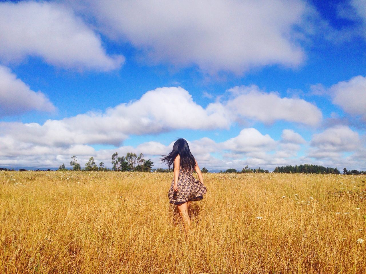 sky, cloud - sky, one woman only, one person, rural scene, field, women, one young woman only, agriculture, adults only, summer, nature, only women, leisure activity, adult, people, young adult, outdoors, young women, standing, landscape, day, beauty in nature