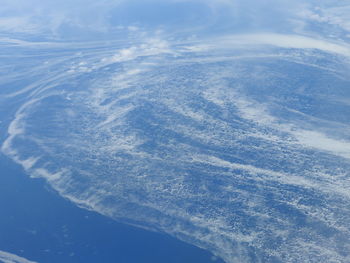 Aerial view of sea against sky