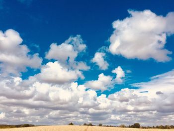 Low angle view of clouds over land