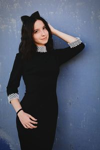 Young woman posing in dress